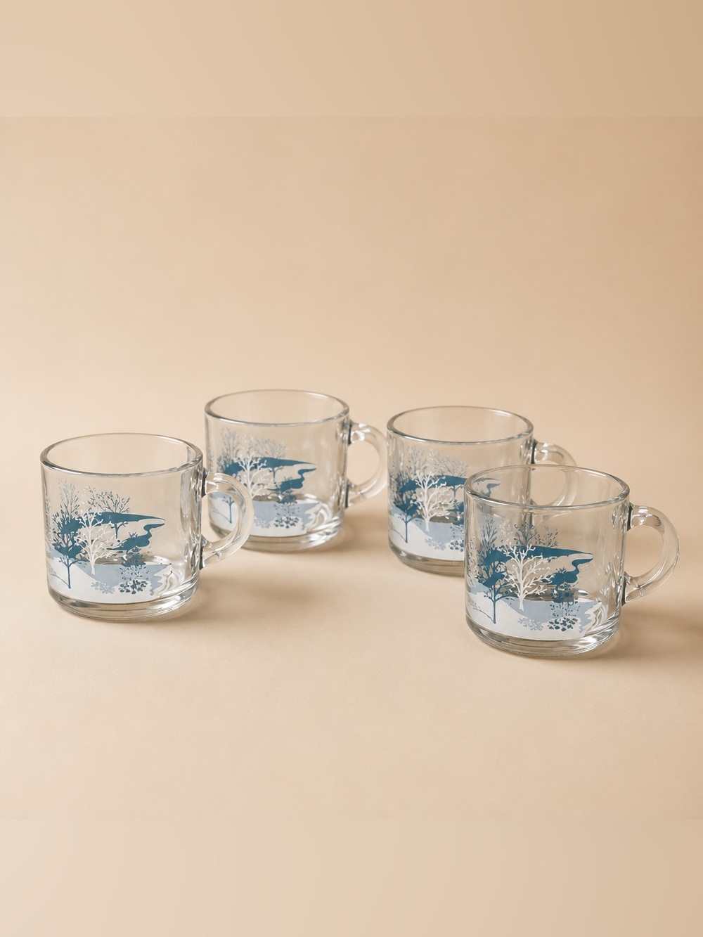 Set of 4Anchor Hocking clear glass coffee mugs featuring a blue-and-white winter